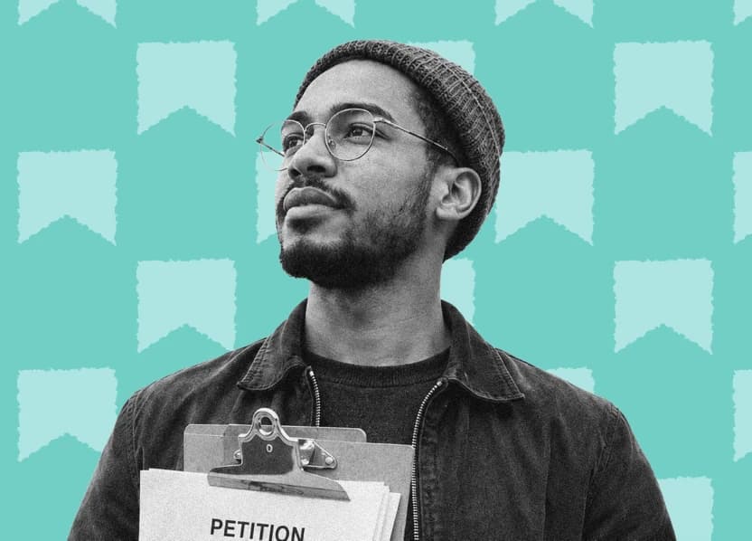 A chapter organizer holding a petition